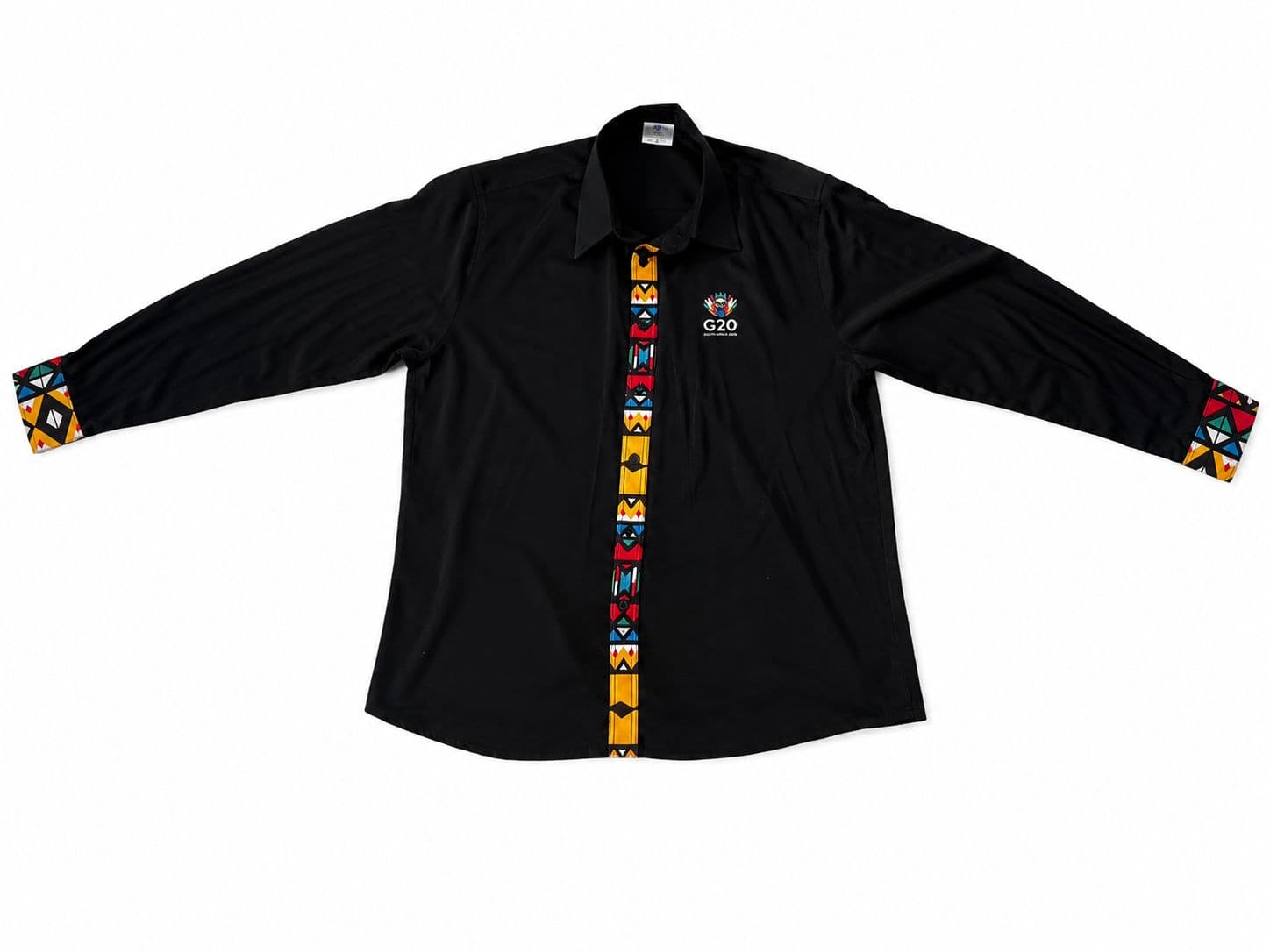 Black shirt with colourful patterned trim